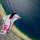 Jamie Flynn flys past Christ The Redeemer in a wingsuit