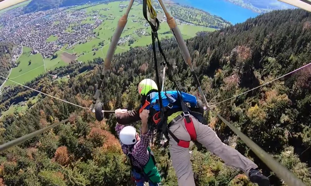 Hang Glider Holds On For Dear Life After Realizing He’s Not Strapped In